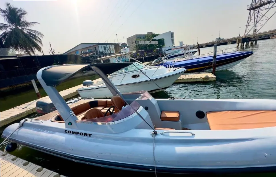 Boats moored at a Lekki marina on a bright Lagos morning